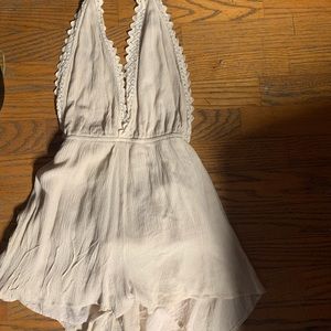 A cream Kendall and Kylie romper